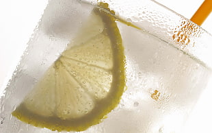 lemon on clear liquid